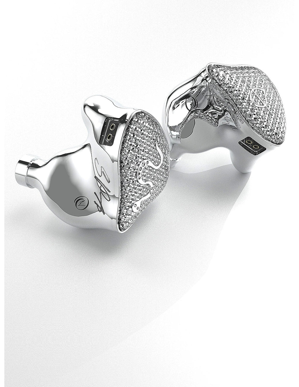 Silver mesh EarAcoustic SPA limited edition earbuds, one pair angled on white